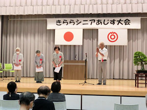 功労者３名